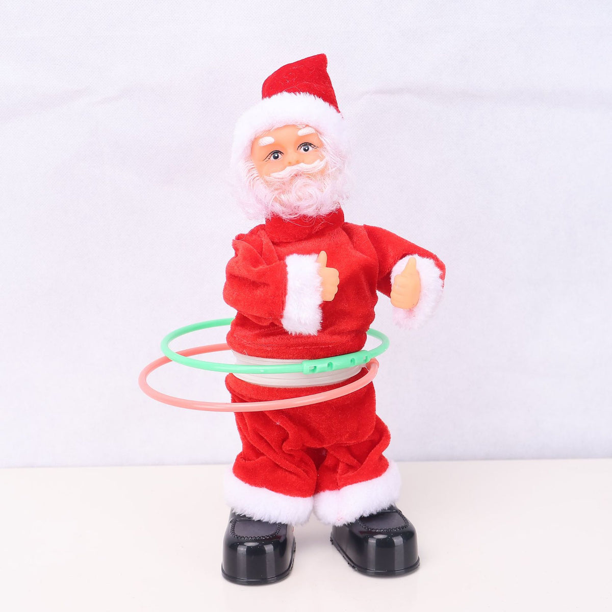 Dekorative Weihnachtsmannfigur mit Süßigkeit