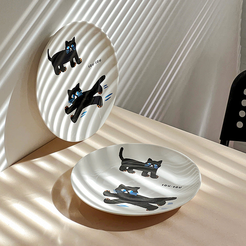 Keramikteller mit verspieltem Katzenmotiv und matt-glänzender Glasur
