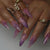 Künstlerische Stiletto Press-On Nagelverlängerungen mit floralem Design Brehn