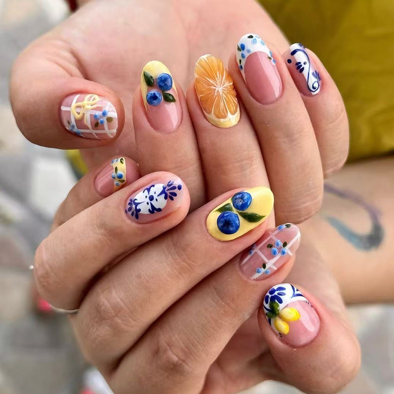 Kunstnagelset mit eleganten Obst- und Blumenmustern Brehn