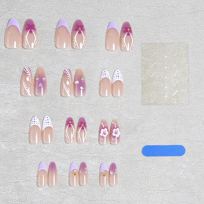 Kunstnagelset mit ekso-tischen Floral- und Glitzerakzenten Brehn