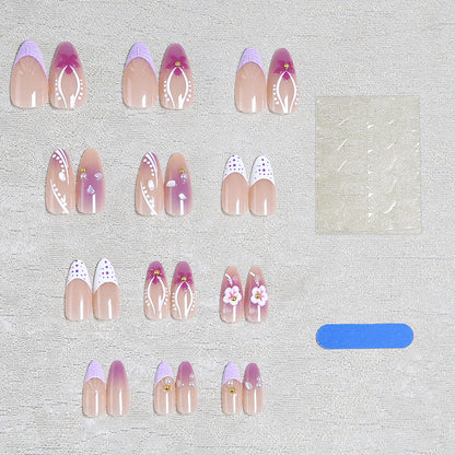 Kunstnagelset mit ekso-tischen Floral- und Glitzerakzenten Brehn