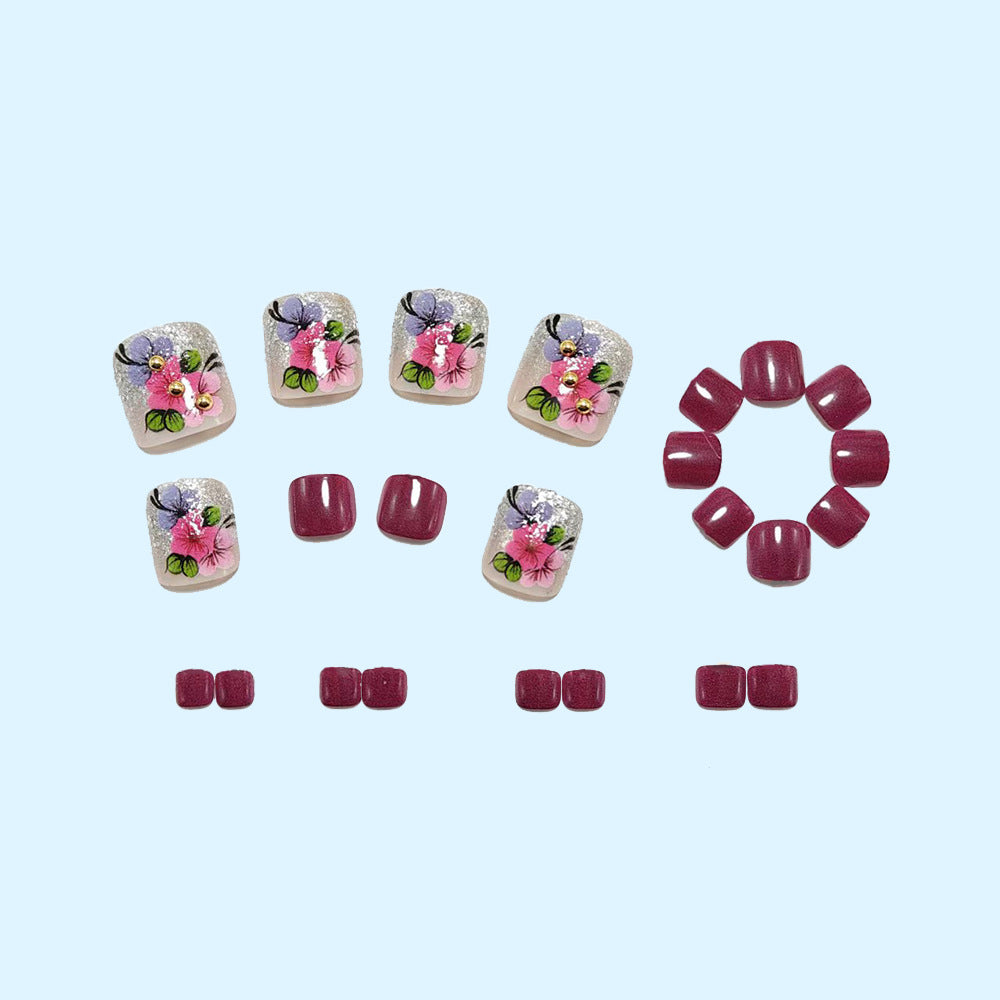 Kunstnägel mit floralen Motiven und Glitzer-Akzenten Brehn