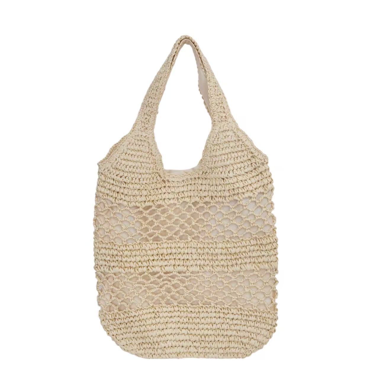 Handtasche Aus Geflochtenem Naturmaterial mit Quastendetails Brehn