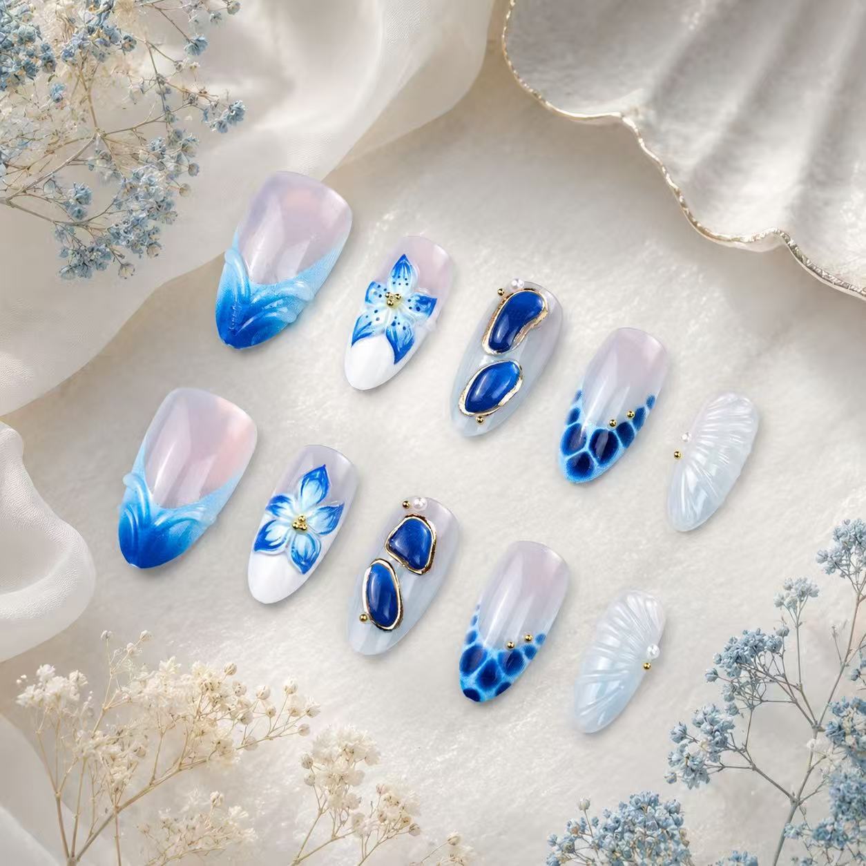 Künstlerisches Press-On Nagelspitzen-Set mit floralen und geometrischen Mustern Brehn