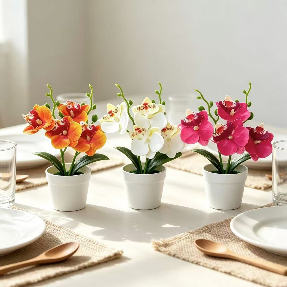 Elegante dekorative Orchideen-Blumenarrangement für die Wohnungseinrichtung