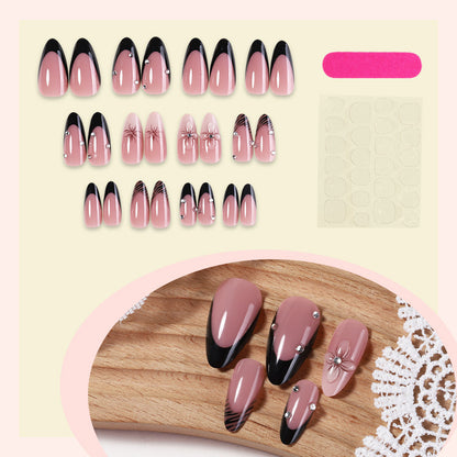 Kunstnagelset mit eleganten Glitzer- und Blumenakzenten Brehn