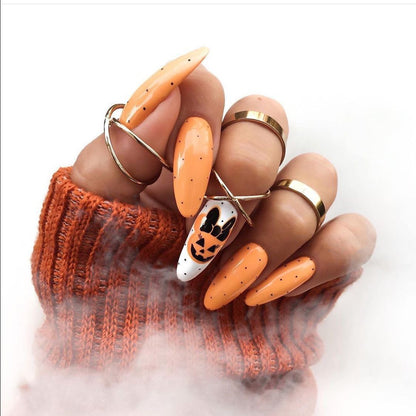 Kunstvolle Nagelverlängerungen mit kreativen Augen-Design Brehn