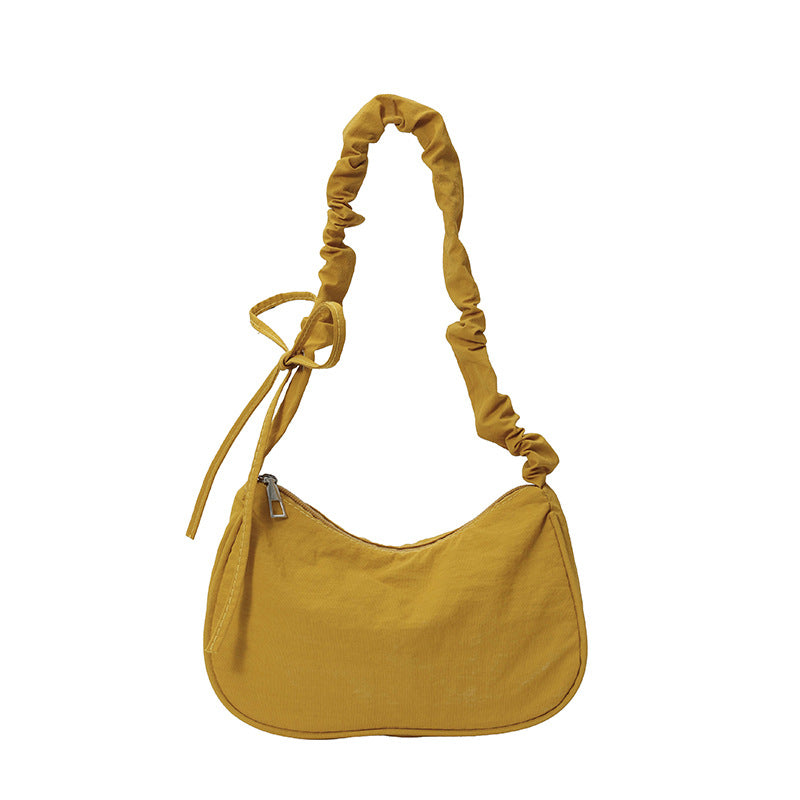 WoTexturiertes Stoff Sling Bag Brehn