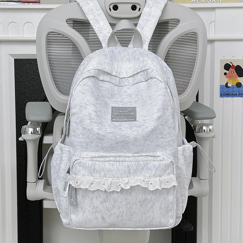 Eleganter Schulrucksack mit Spitzenbesatz