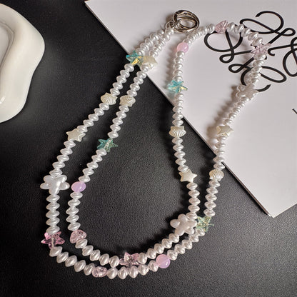 Eleganter Perlenbesetzter Brillenhalter Brehn