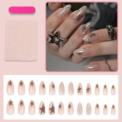 Kunstnagelset mit eleganten Sternenmotiven und Glitzerakzenten Brehn