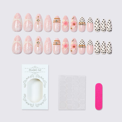 Kunstnagelset mit floralen und glitzernden Akzenten Brehn