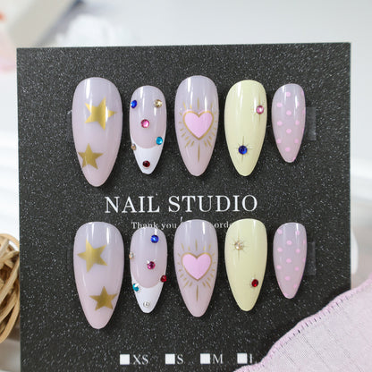 Kunstnagelset mit stilvollen Herz- und Sternmotiven Brehn