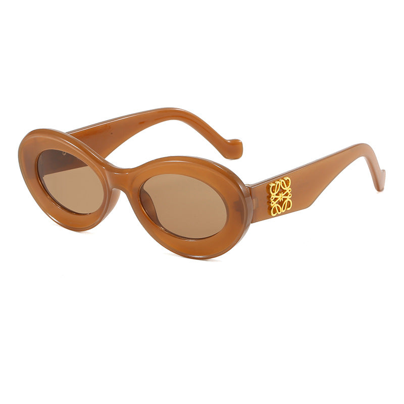 Damen modische Sonnenbrille mit ovalem Rahmen und goldenen Applikationen Brehn