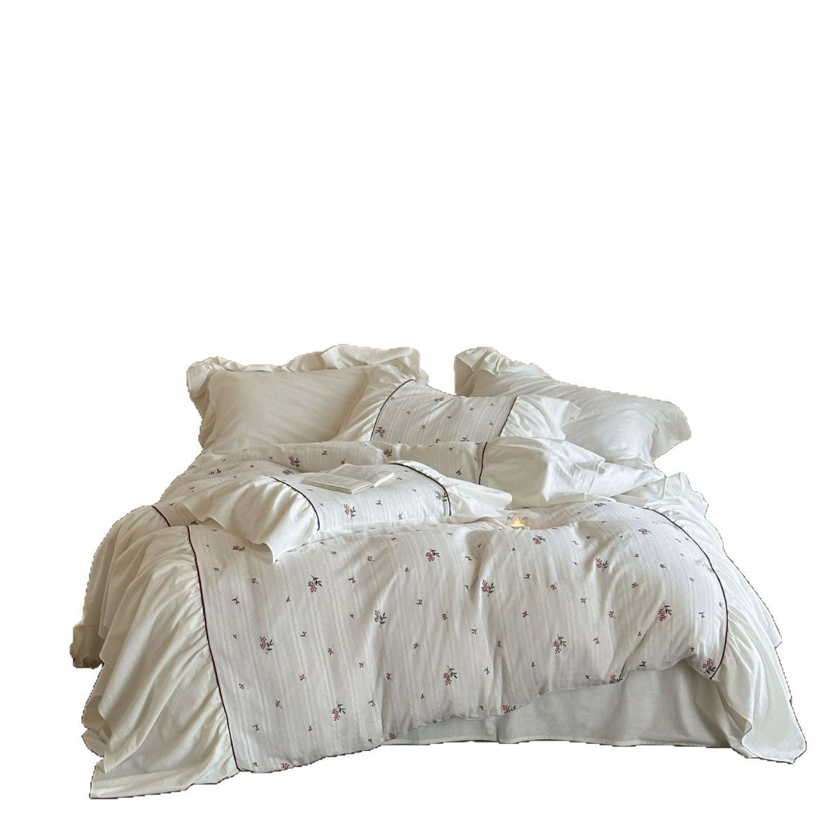 Bettwäsche-Set aus Baumwolle mit feiner Blütenstickerei, Volantkissen und Paspel Brehn