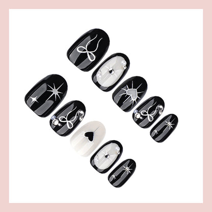 Kunstnagelset mit elegantem Schleifen- und Herzdesign Brehn