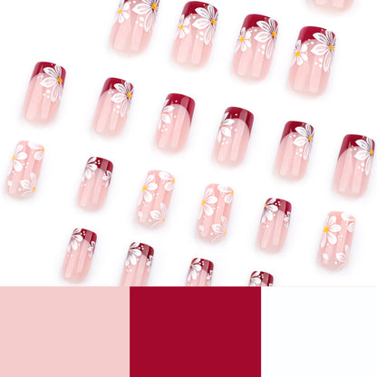 Kunstvolle Nagelverlängerungen mit Blumenmotiv Brehn