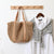 Damen Handtasche aus handgefertigtem Naturmaterial mit eleganten Lederakzenten Brehn
