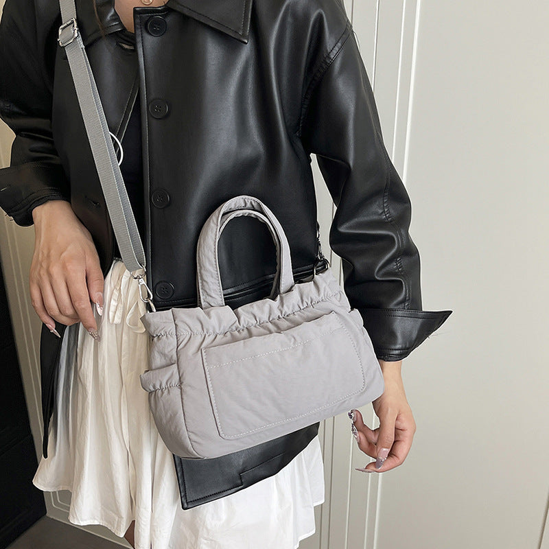 Gepolsterte Utility-Handtasche