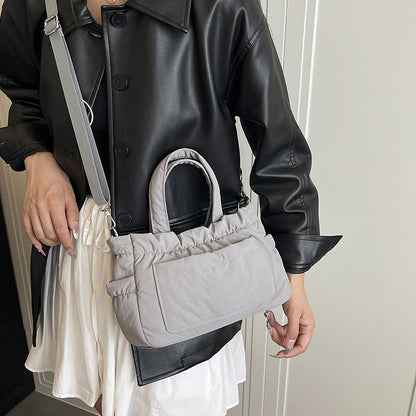 Gepolsterte Utility-Handtasche