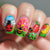 Kunstvolle Nail Art mit Insekten- und Blumenmotiven Brehn