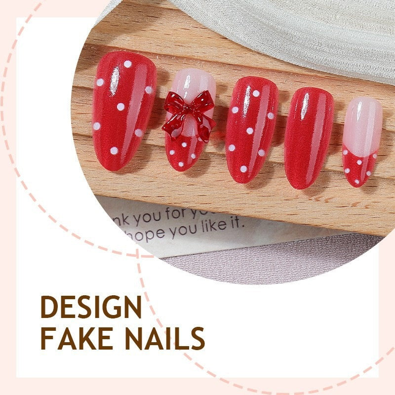 Kunstnagelset mit verspieltem Schleifen-Design und polka Punkte Brehn