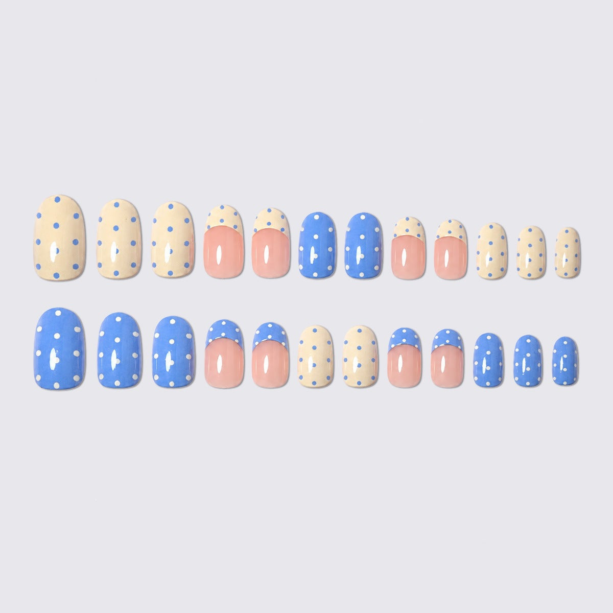 Kunstnagelset mit spielerischen Punkten und eleganten Designs Brehn
