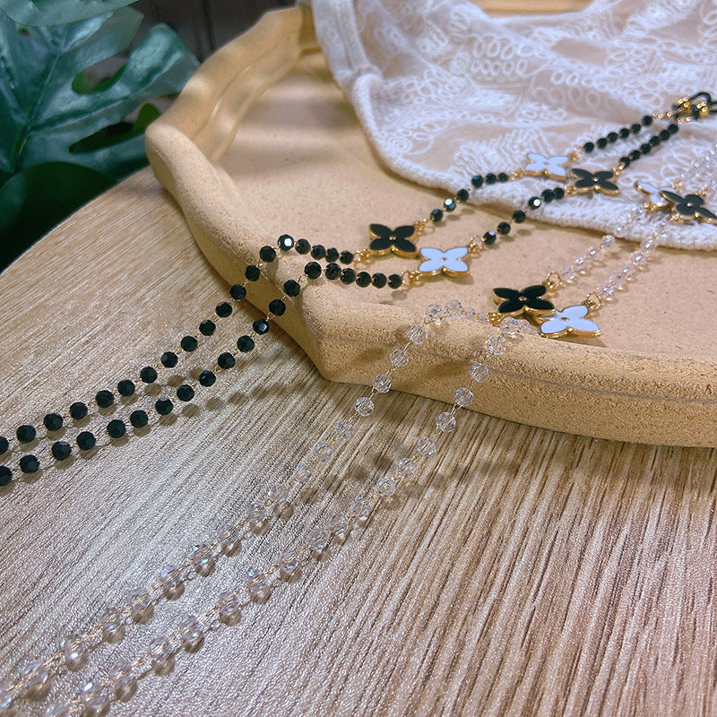 Elegante Perlenkette mit Blütenanhängern Brehn