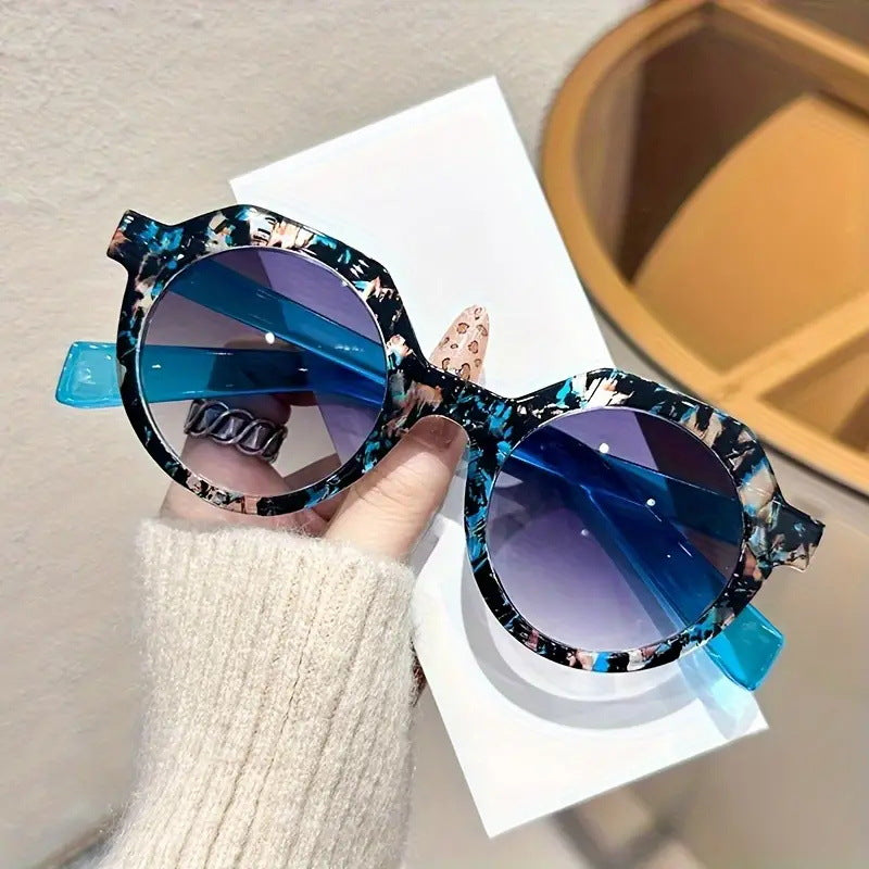 Damen extravagante runde Sonnenbrille mit farblich akzentuiertem Rahmen Brehn
