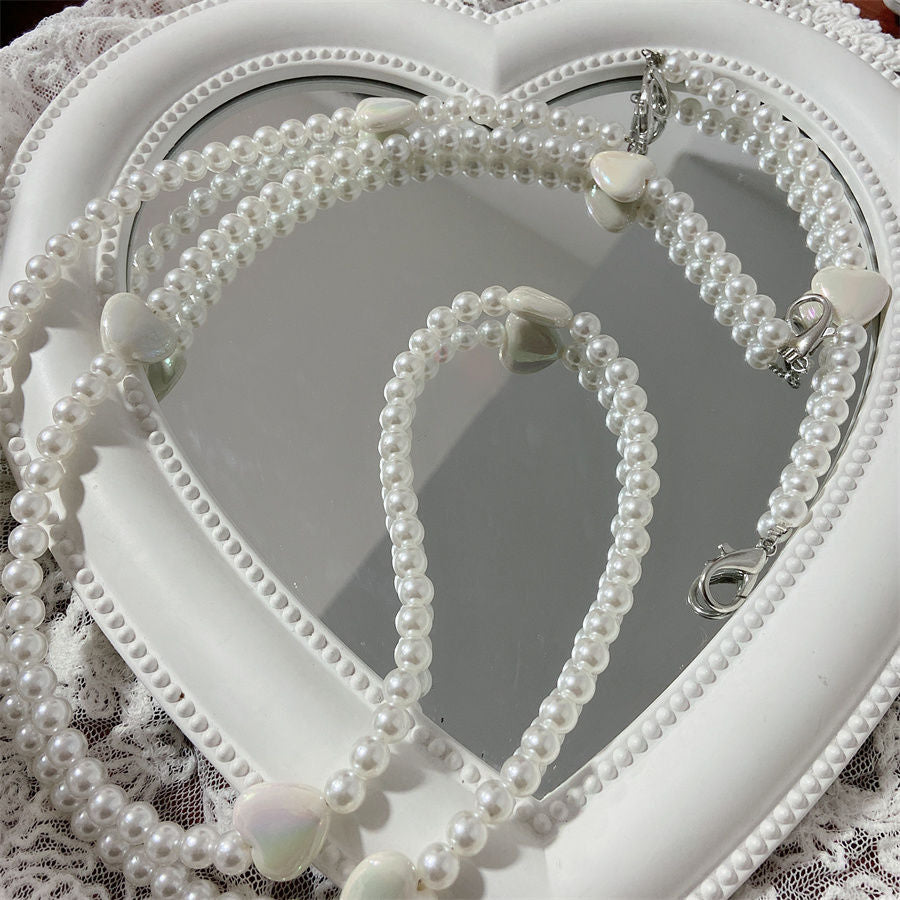 Eleganter Perlenbesetzter Brillenhalter Brehn