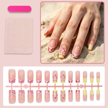 Kunstnagelset mit floralen Akzenten und Glitzerverzierungen Brehn