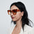 Damen modische quadratische Sonnenbrille mit transparentem Rahmen Brehn
