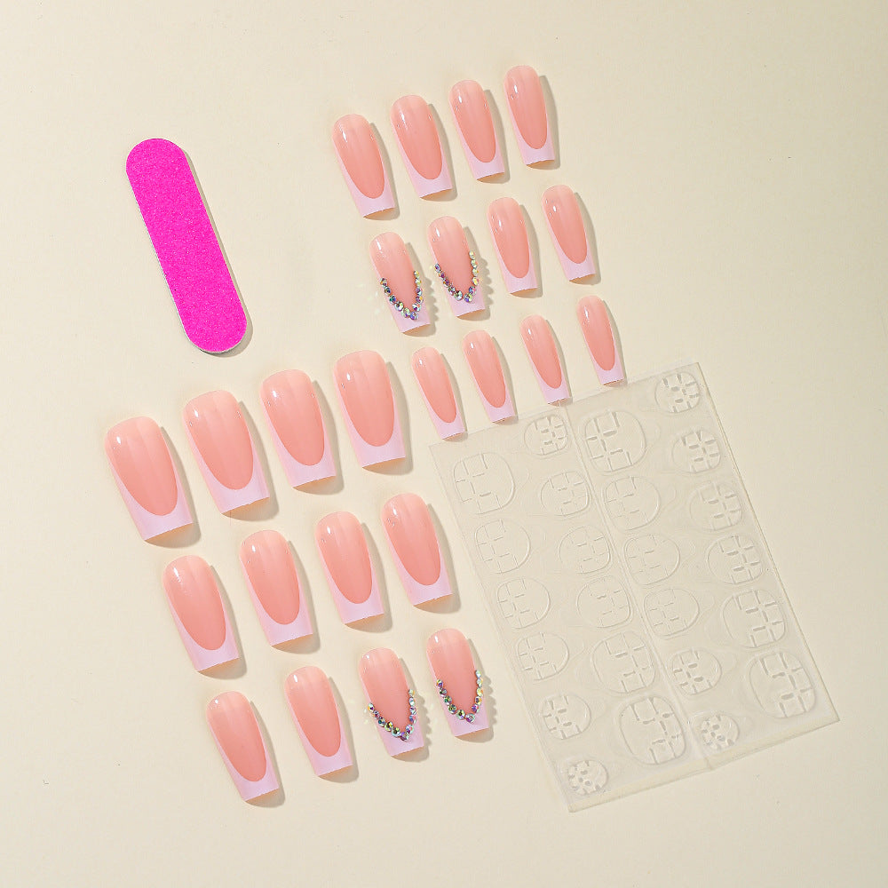 Elegante French Tip Acryl-Nagelerweiterungen mit Strassakzenten Brehn
