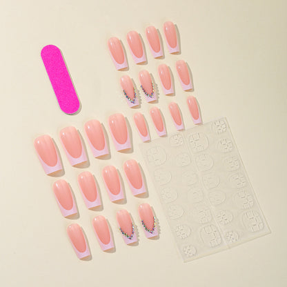 Elegante French Tip Acryl-Nagelerweiterungen mit Strassakzenten Brehn