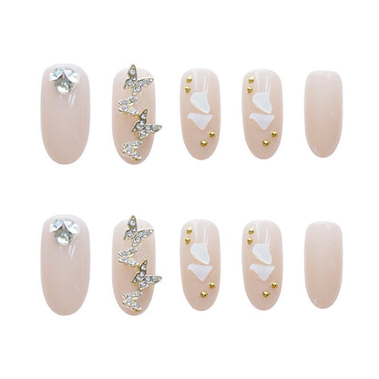 Luxuriöse dekorative Press-On Nagelkunst mit Edelsteindetails Brehn