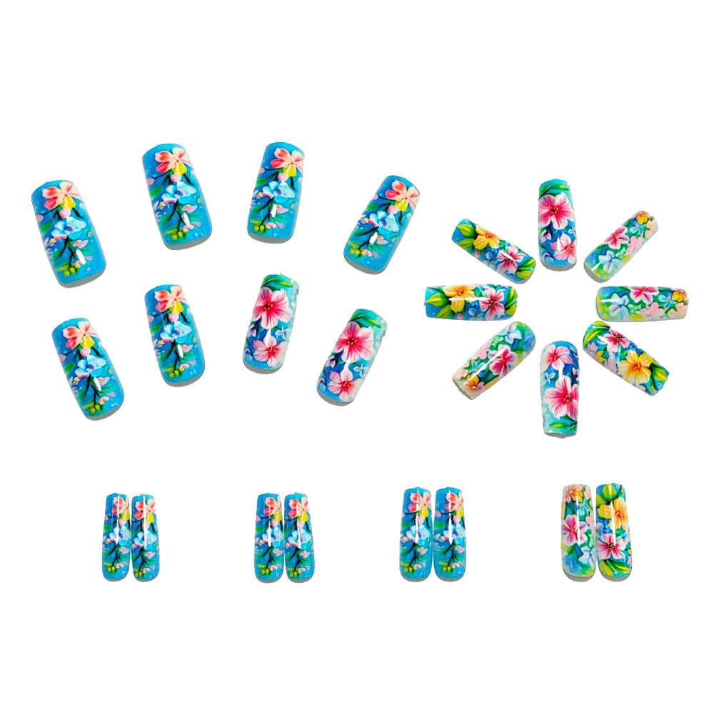 Kunstnagelset mit Blütenmotiv und Glanzfinish Brehn