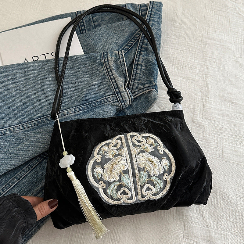 Elegante gestickte Abendhandtasche