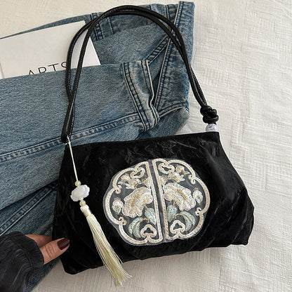 Elegante gestickte Abendhandtasche