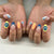 Künstlerisches Press-On-Nagelset mit floralem und geometrischem Design Brehn