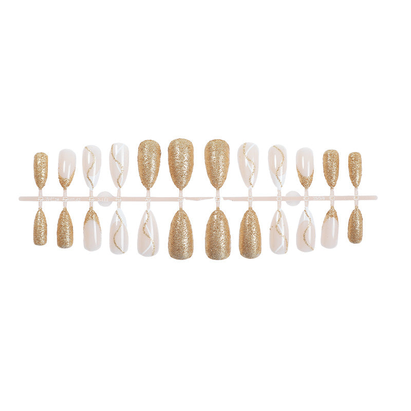 Elegantes Press-On-Nail-Set mit Glitzer und goldenen Wirbelakzenten Brehn