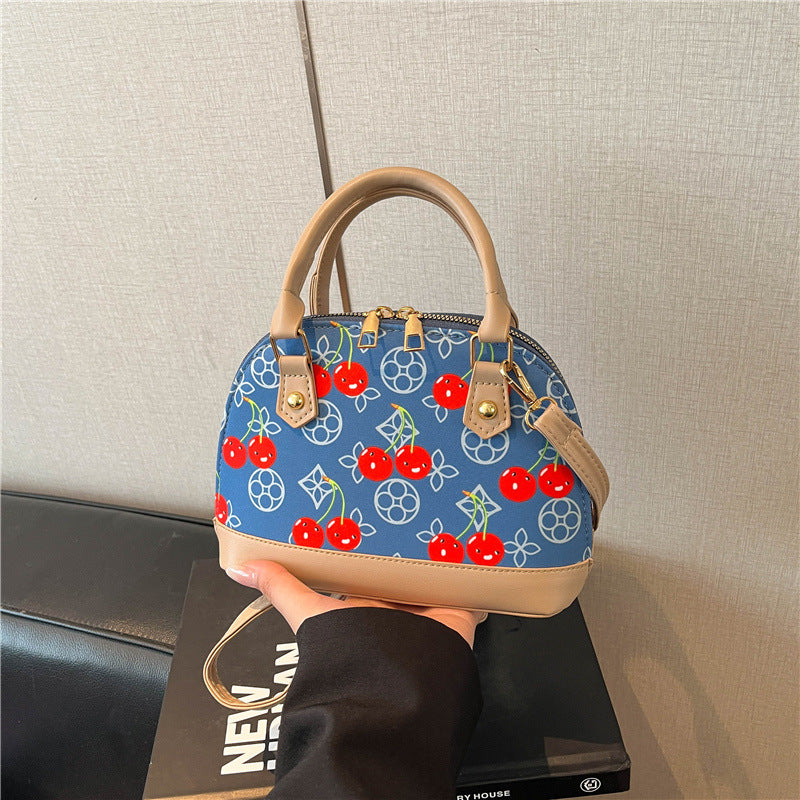 WoBestickte Kirschmuster-Handtasche Brehn