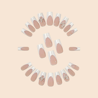 Verschnörkelte Schmetterlings-Nagelkunstverlängerungen