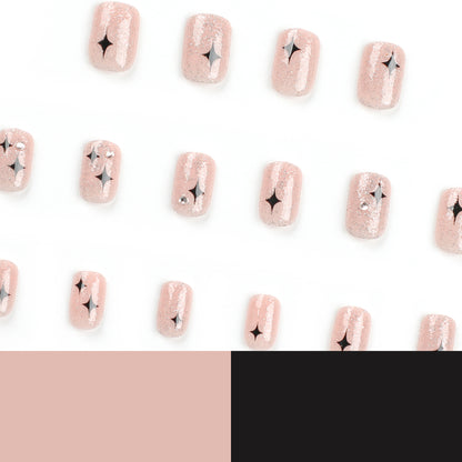 Kunstvolle Nagelverlängerungen mit Glitzer- und Sternenmuster Brehn