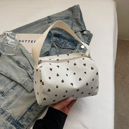 Hübsche Handtasche mit Herzmuster