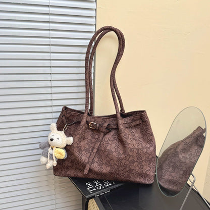 Elegante Handtasche mit floralem Muster