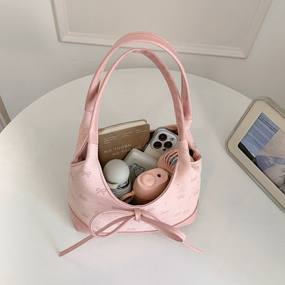 Schleifenverzierter Handtasche