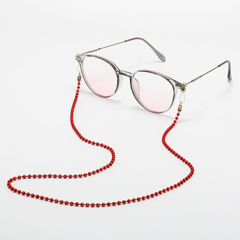 Modische Katzenaugenbrille mit Perlenkette Brehn
