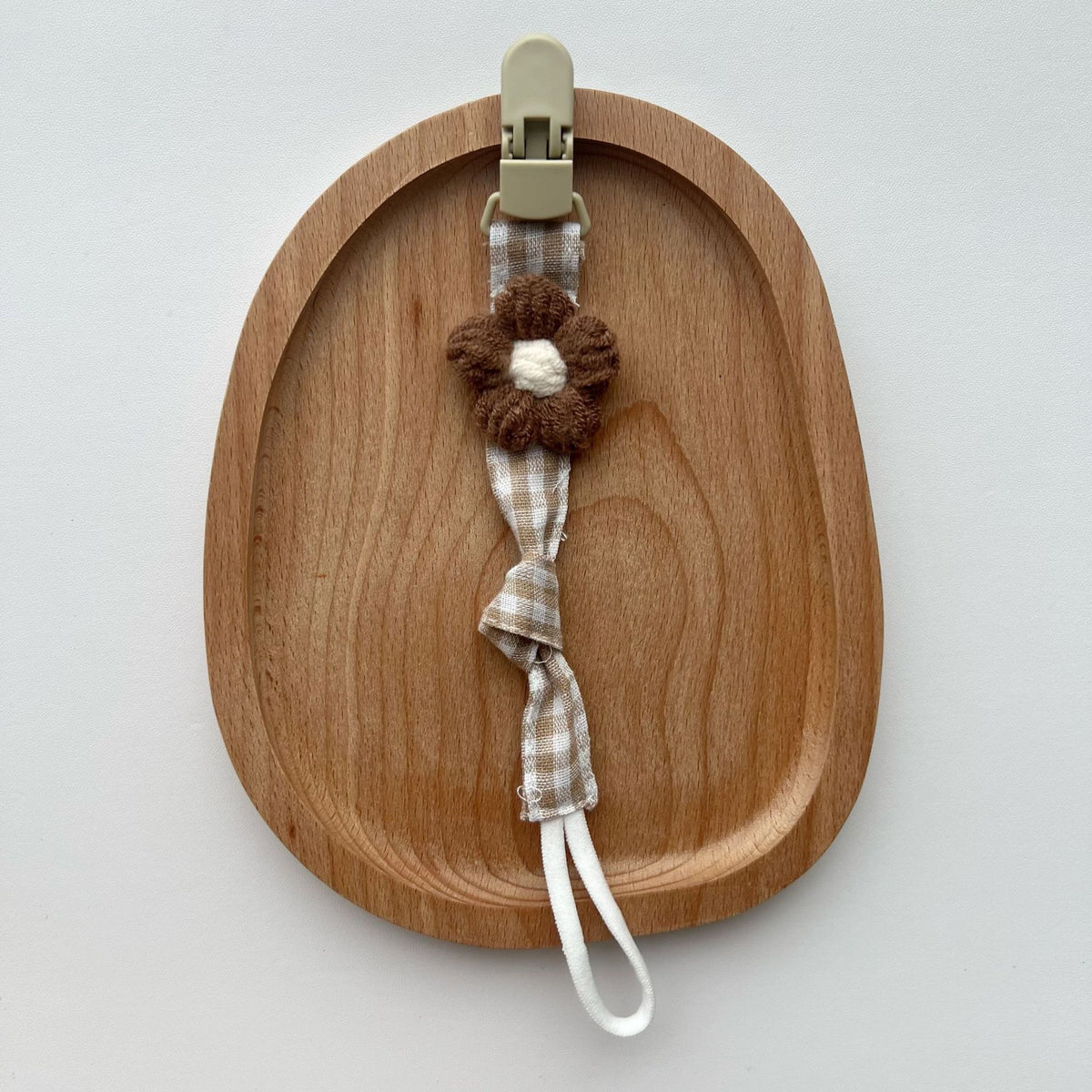 Schnuller- und Beißringclip mit Holz-Sicherheitsclip und gehäkelter Blume