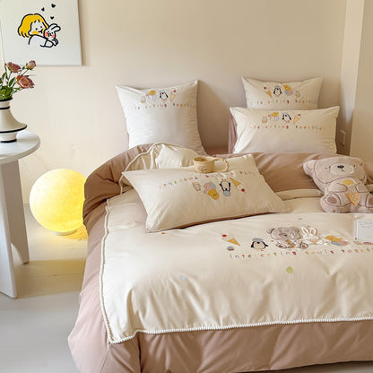 Besticktes Baumwollsatin Bettbezug-Set mit Pom-Pom-Bordüre und passenden Kissenbezügen